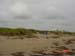 Beach debris at Galveston County litter barrel 21