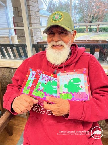 Veteran Holding Valentines Day Cards