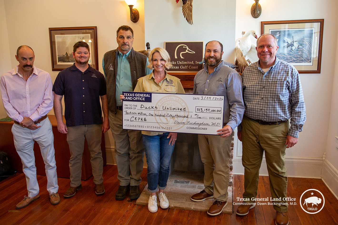Left to right: Daniel Stanbery, Michael Plaza, Todd Merendino, Texas Land Commissioner Dawn Buckingham, M.D., Taylor Abshier, and Kevin Hartke at a Coastal Check Presentation on March 24, 2026