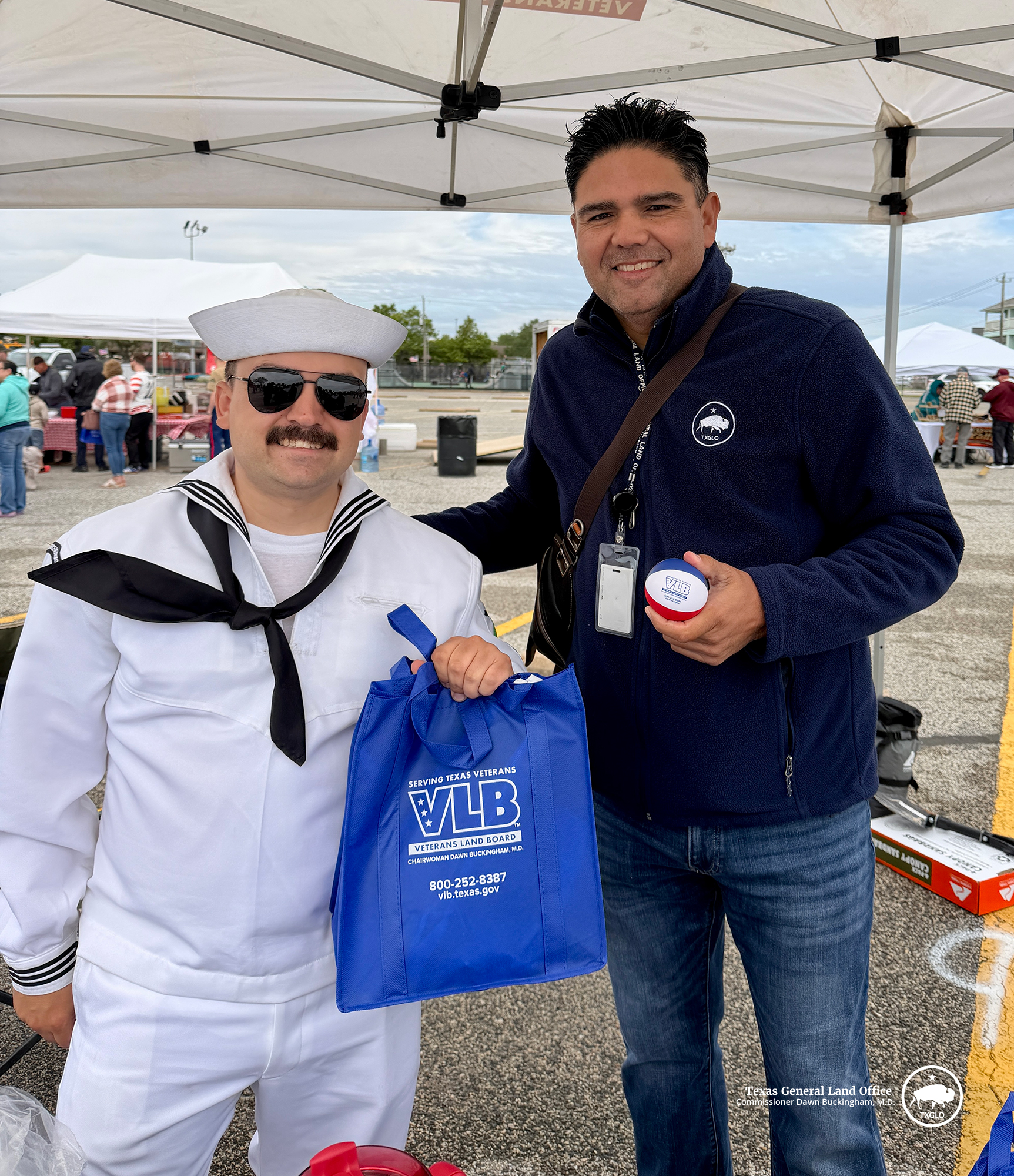 Pete Garcia, VLB Marketing and Outreach Coordinator for the South Texas Region, with a U.S. Navy sailor during the 2026 Fleet Week in Houston