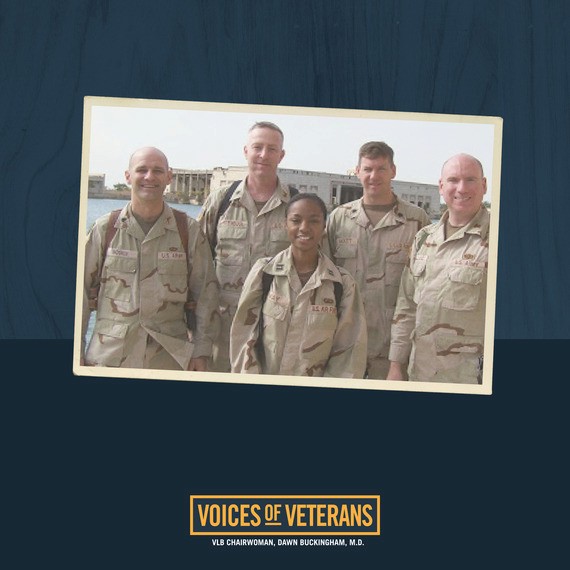 Captain Ebony May with fellow military members